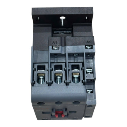 A three-phase electrical contactor with a dark gray plastic housing, featuring terminal screws labeled A1, A2, and L1, with a red handle on the lower terminal block, shown against a plain white background.