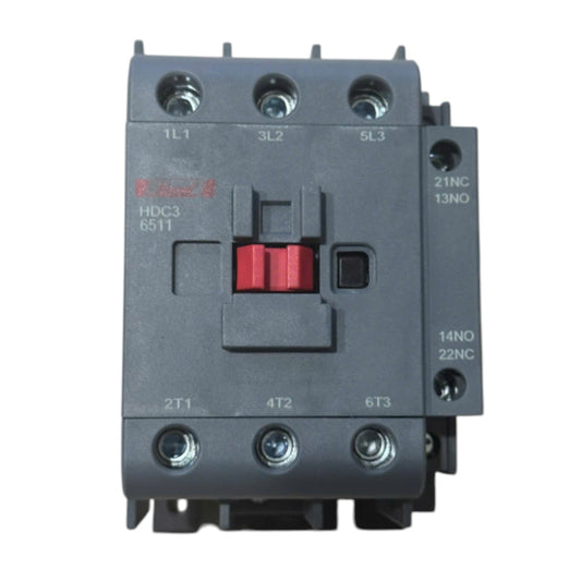 A black industrial contactor relay with a red central switch and white terminal labels, photographed on a plain white background.