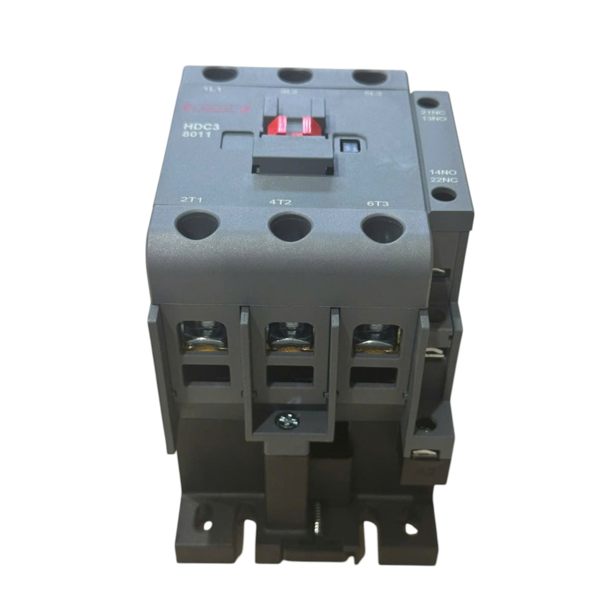 A dark gray industrial contactor relay with three main terminal blocks and a red switch, photographed on a solid white background.