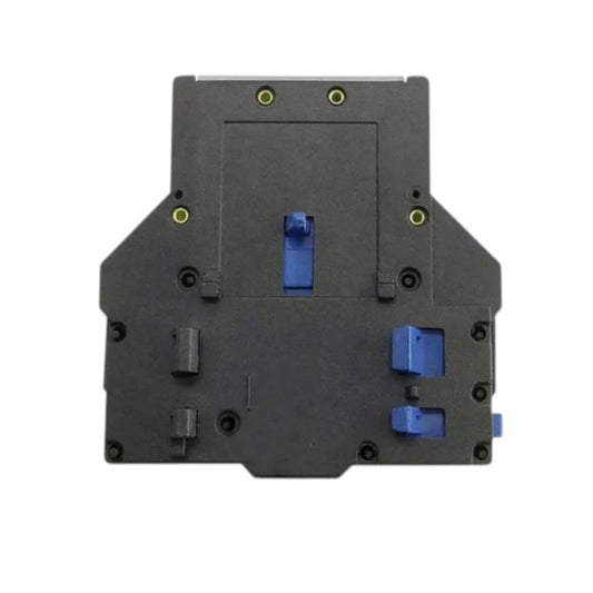 A dark gray industrial electronic module or connector housing with blue plastic components and small gold screw terminals, shown against a plain white background.