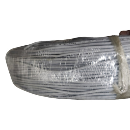 Coiled cable with clear plastic wrap on a white background
