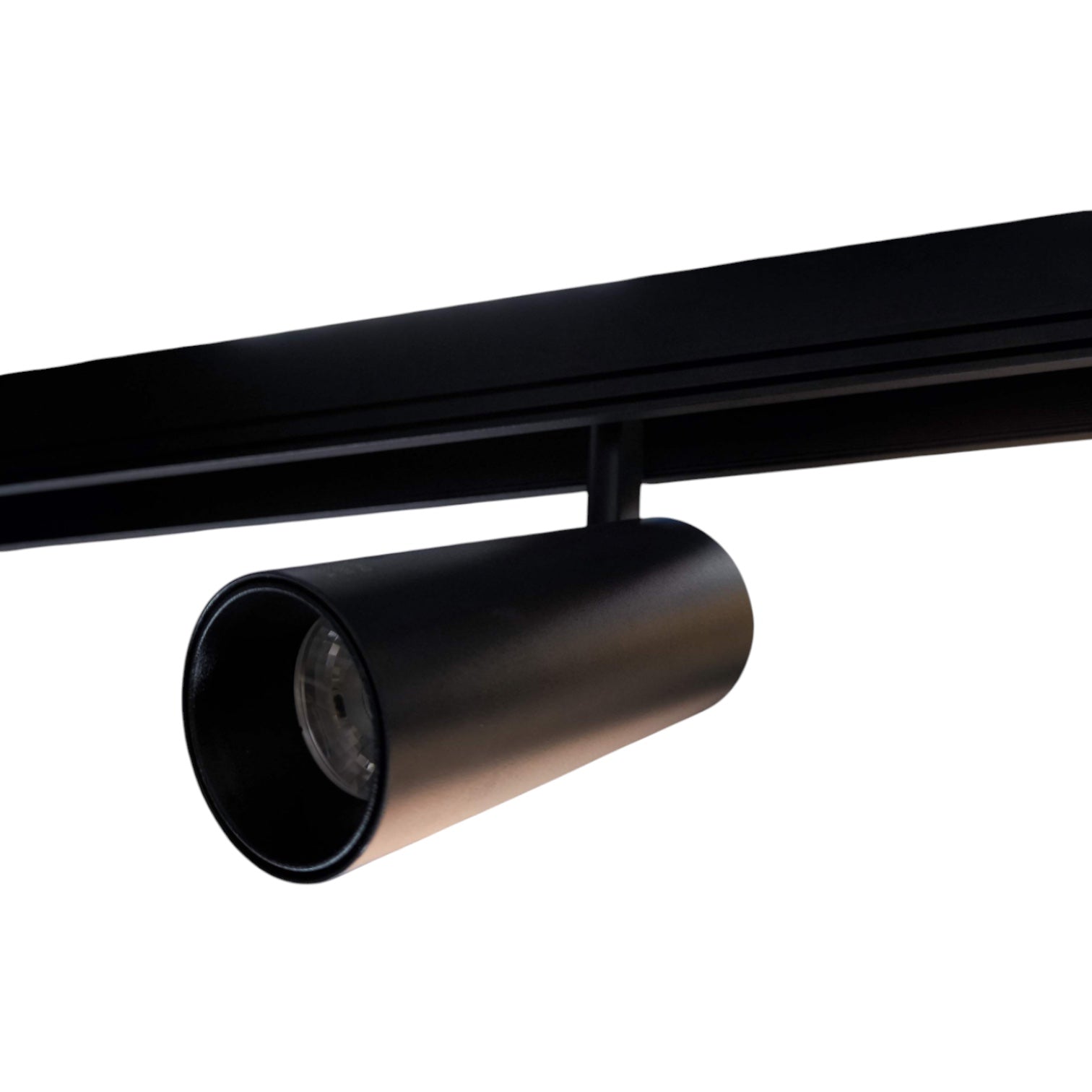 A modern black cylindrical track spotlight mounted on a black metal track bar against a solid white background.