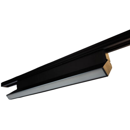 A close-up of a modern linear LED light fixture with a black housing and a gold-colored end cap, shown against a plain white background.