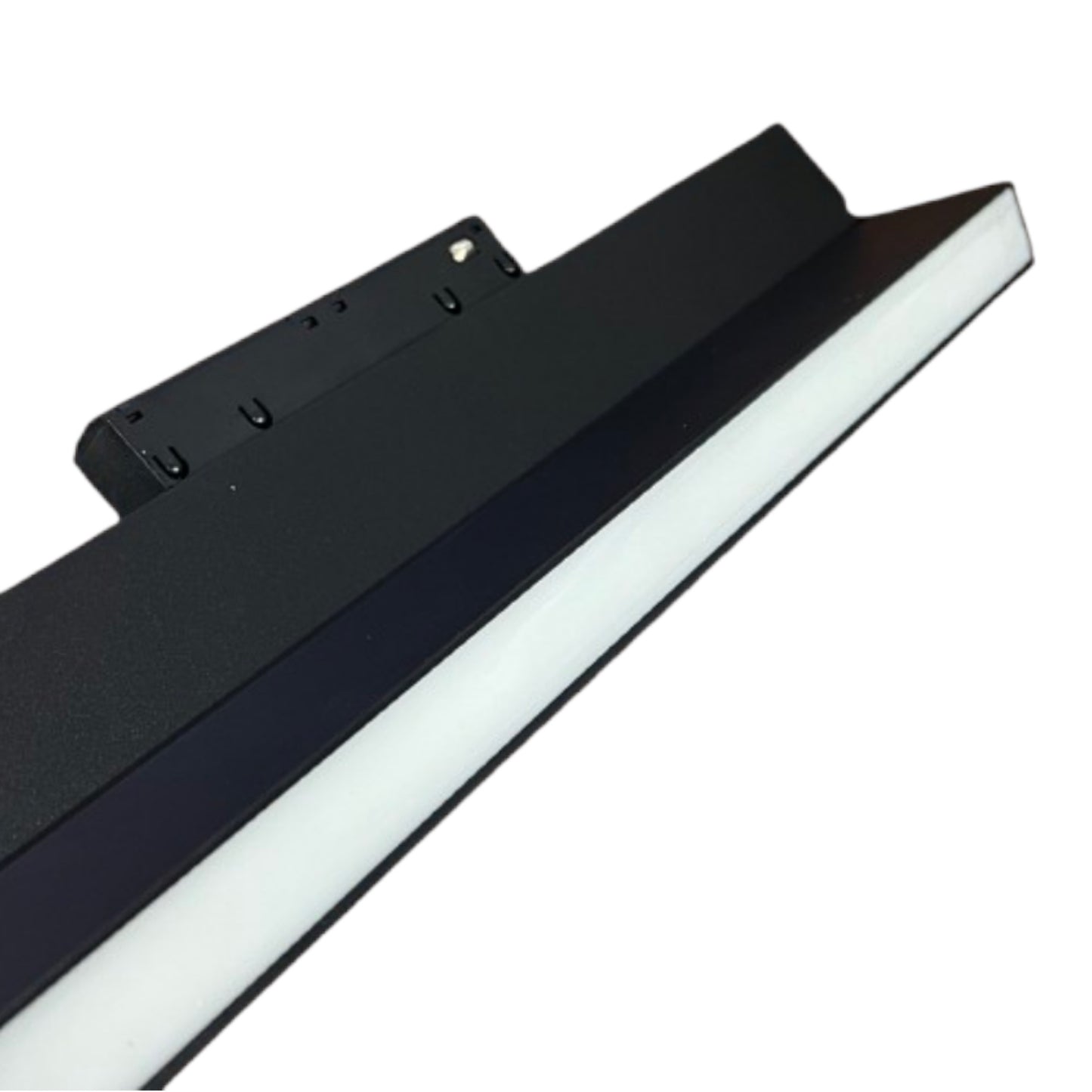 A close-up of a modern linear LED light bar with a matte black frame and a bright white diffuser, shown against a plain white background.