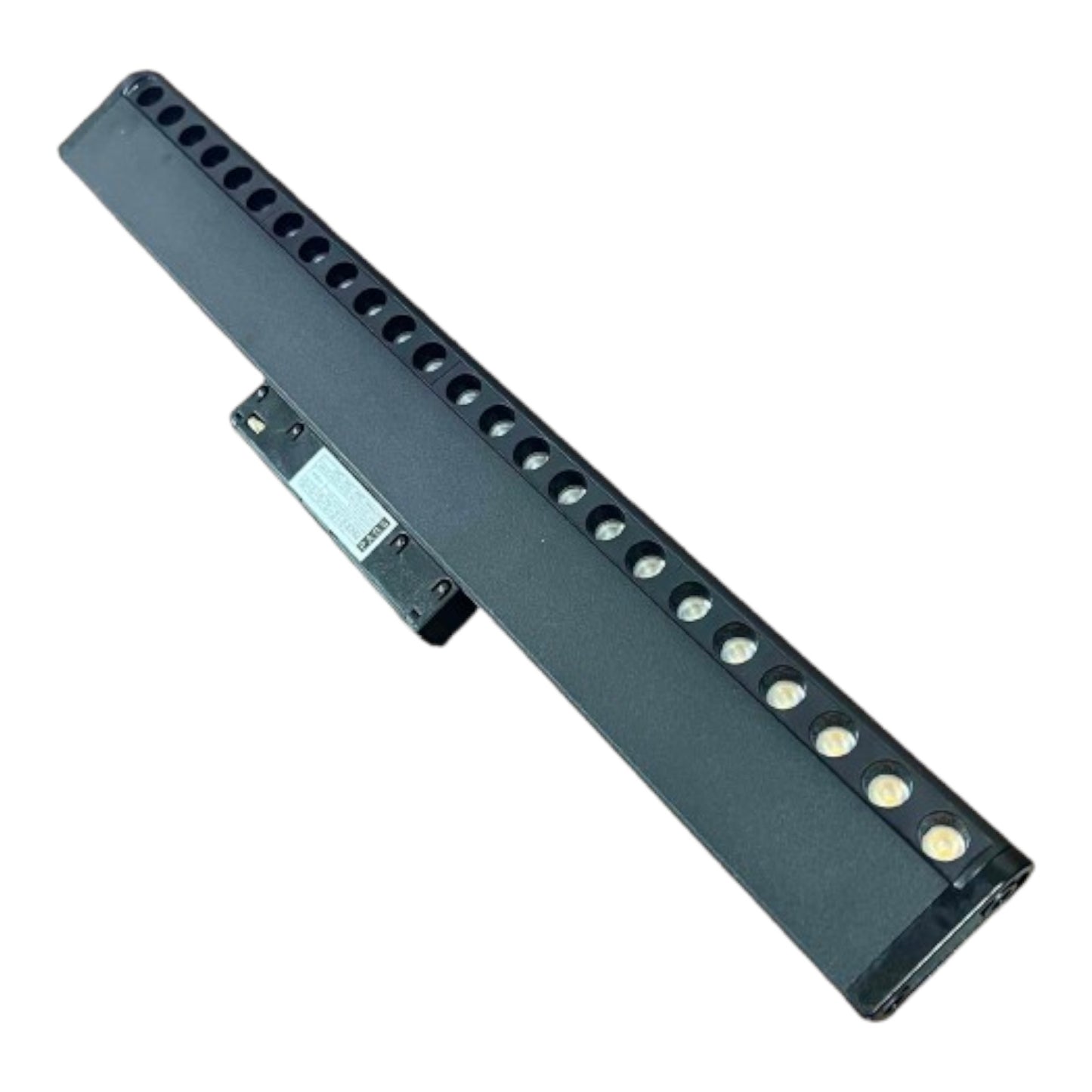 A long, narrow black rectangular electronic component with multiple circular cutouts and small metallic circular elements along one side, shown on a plain white background.