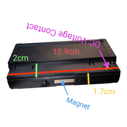A black rectangular electronic component or battery-like device shown on a white background with overlaid measurement labels and arrows indicating dimensions: 10.9 cm, 2 cm, 1.