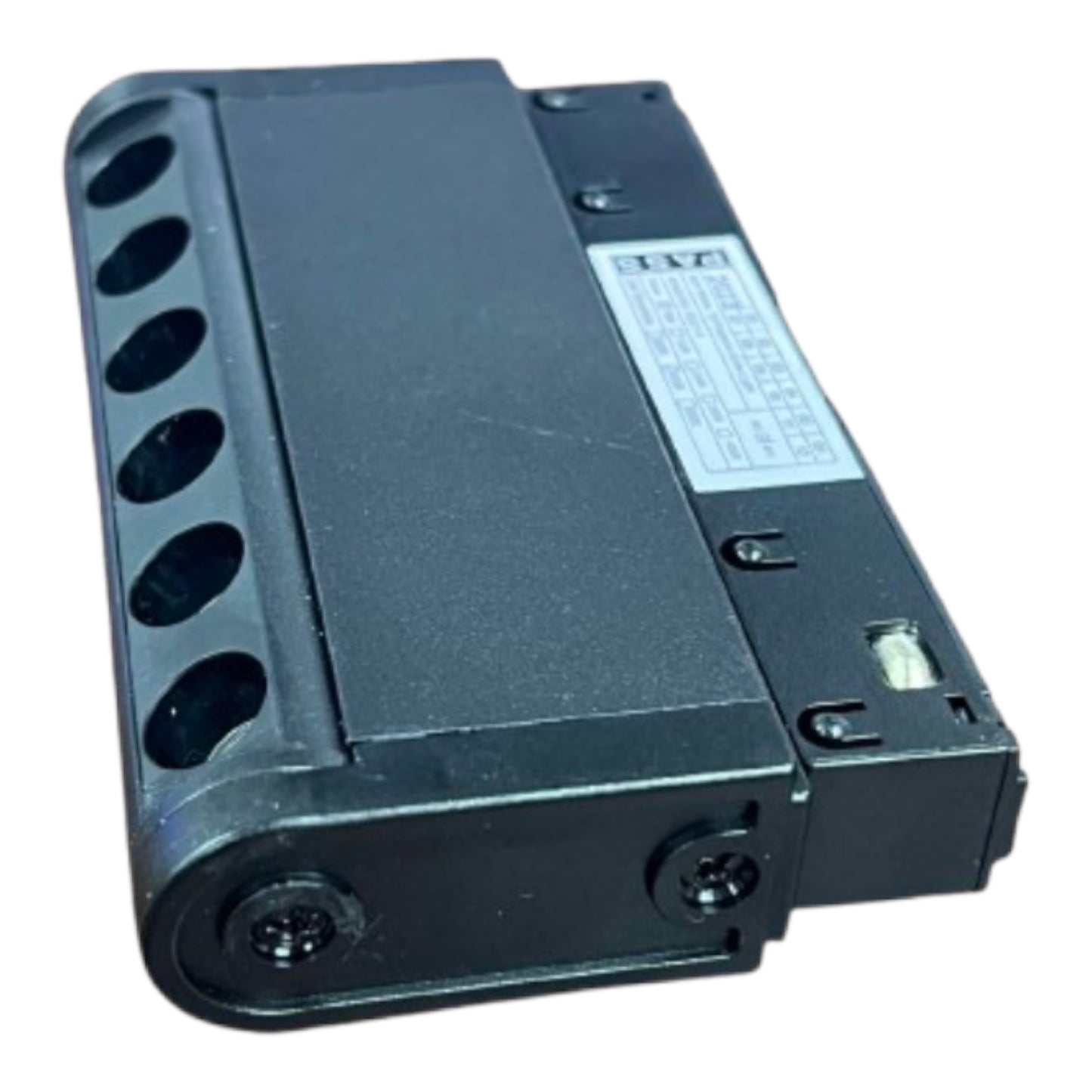 A black plastic electrical terminal block or connector module with multiple circular mounting holes on one side and a white specification label, shown on a plain white background.