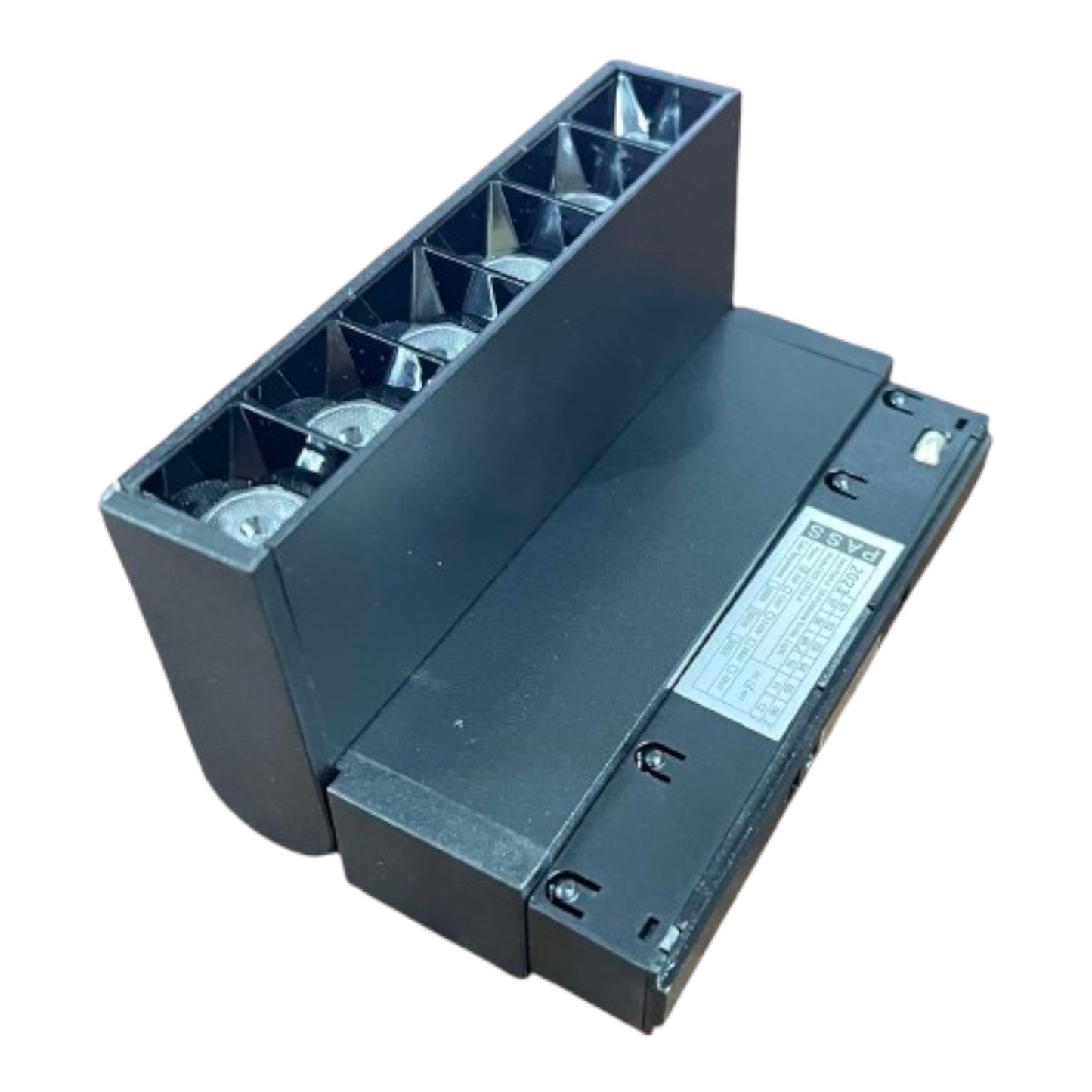 A black industrial electrical component, likely a terminal block or relay module, photographed on a plain white background.