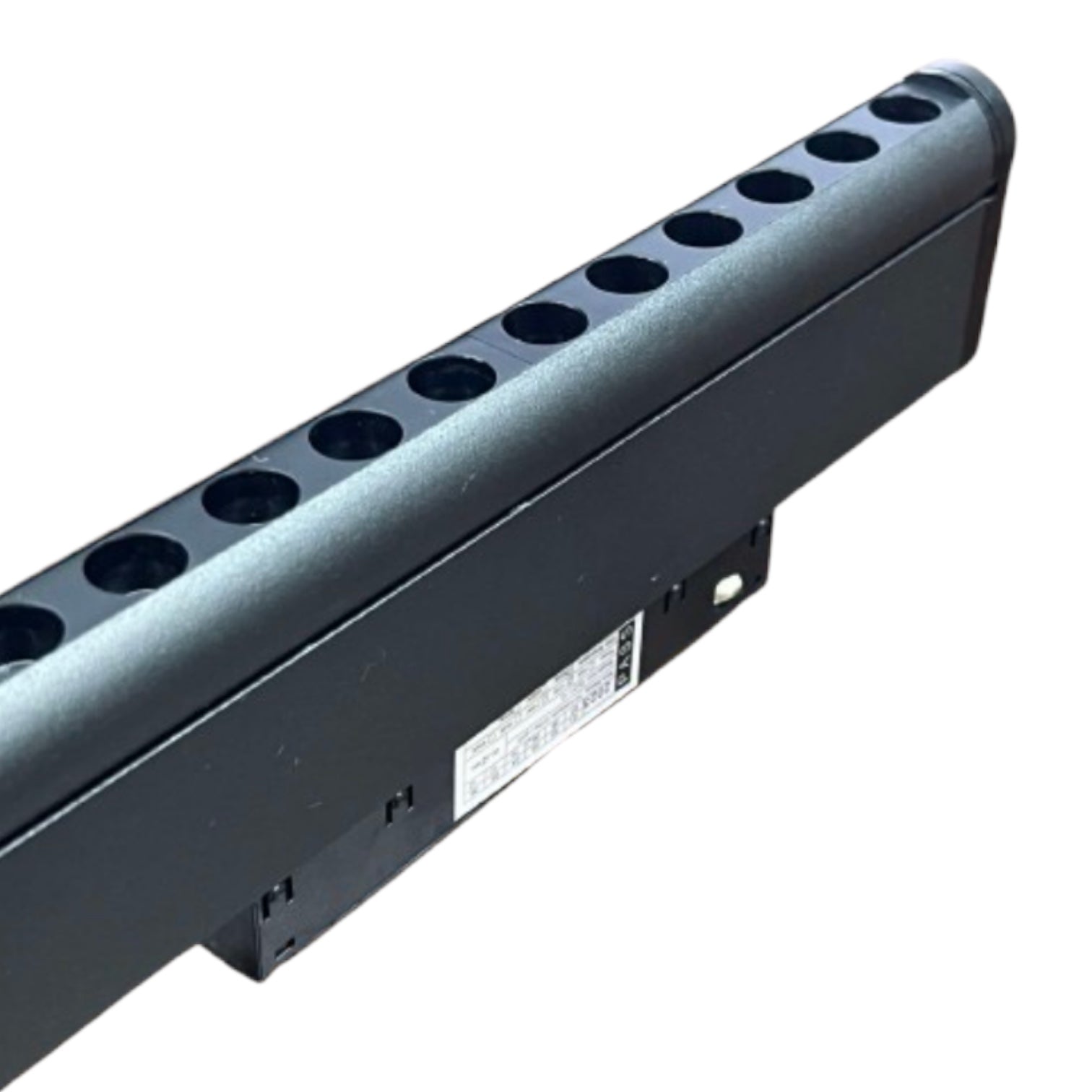 A close-up of a black metal mounting bracket or channel with multiple circular holes along the top edge, shown on a plain white background.