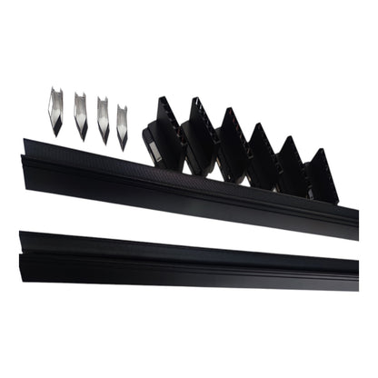 Black linear LED track lighting fixture components shown on a white background, including two long rails, several angled reflector plates, and four clear lens pieces.