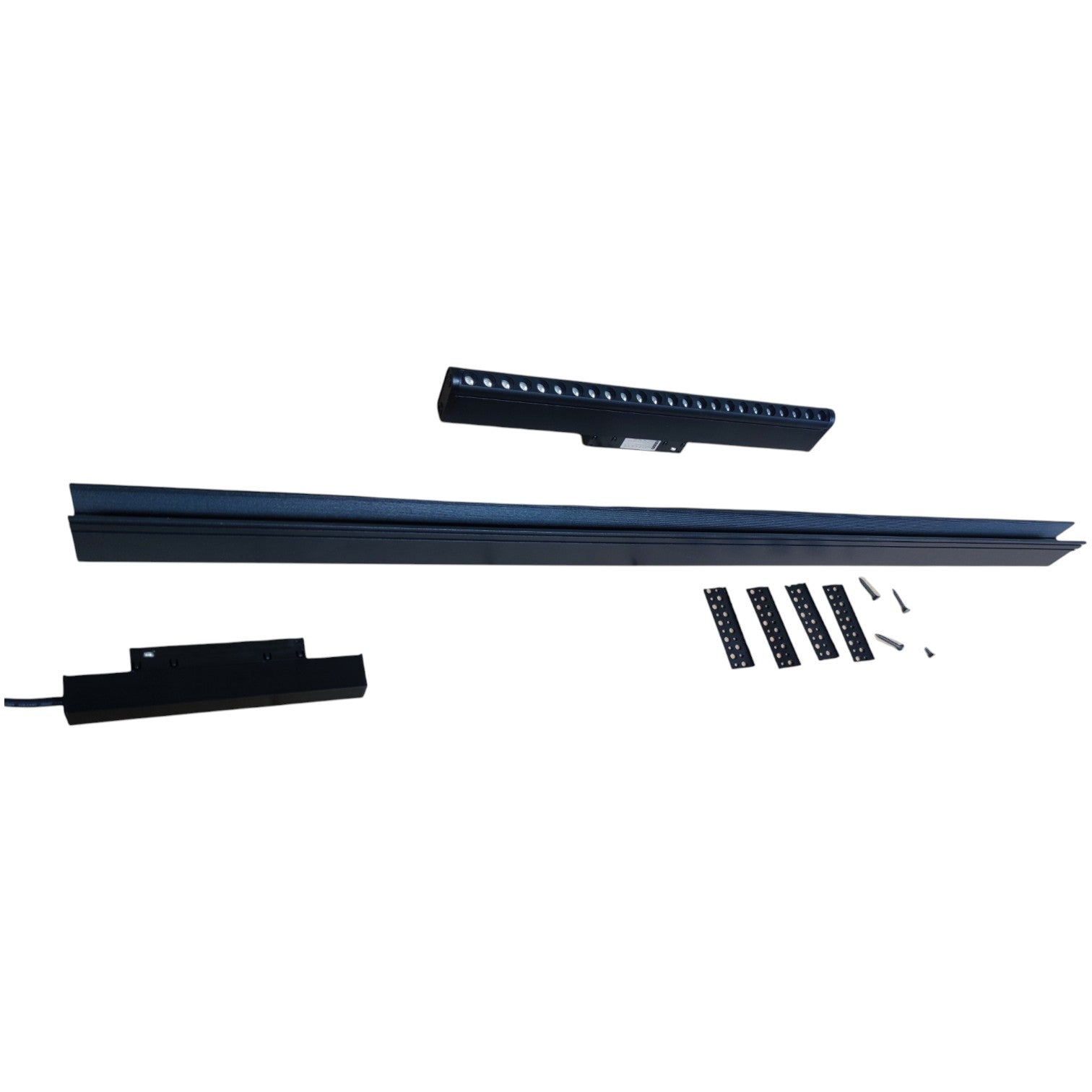 Set of black LED strip lights with mounting hardware on a white background