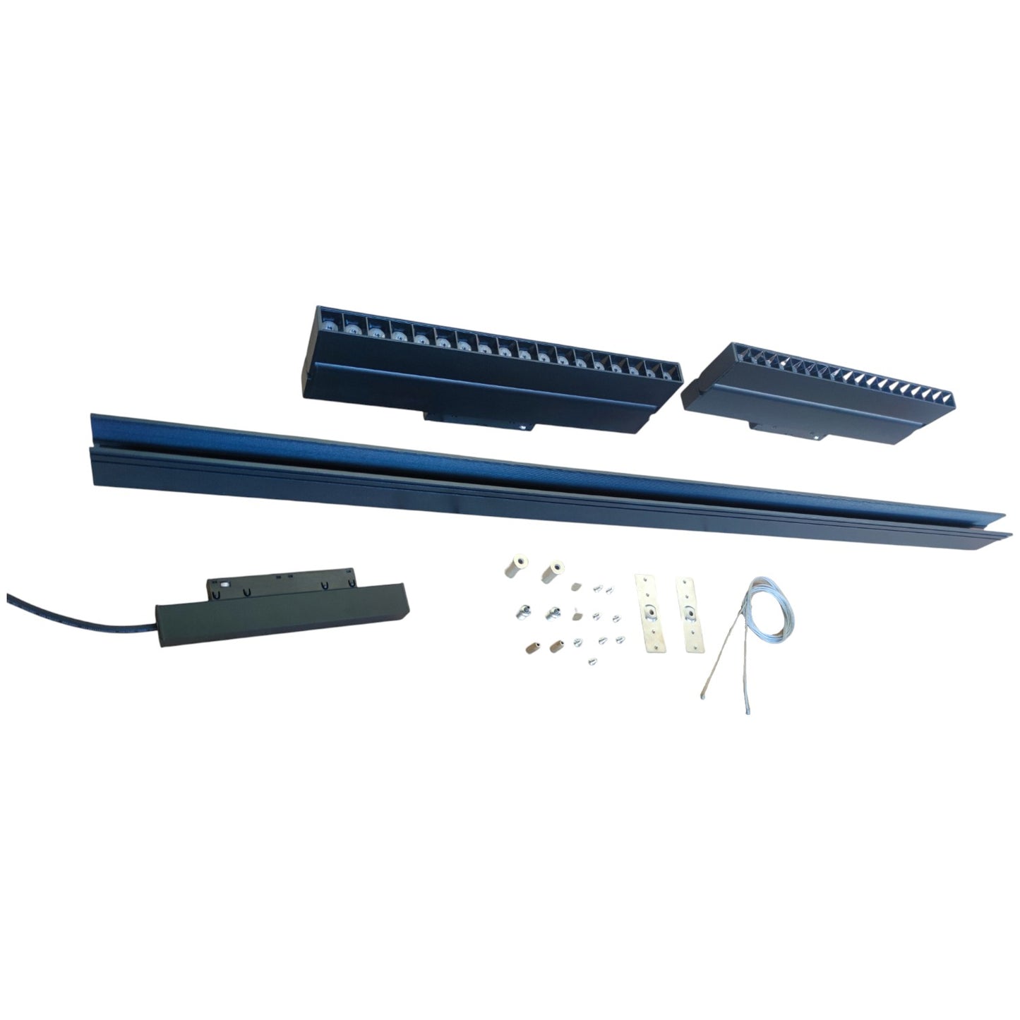 Set of LED strip lights and related components on a white background