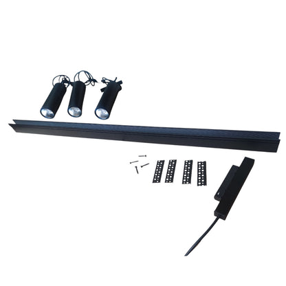 Black metal track lighting kit with three adjustable spotlight heads, a long linear track, mounting brackets, screws, and a power adapter on a plain white background.