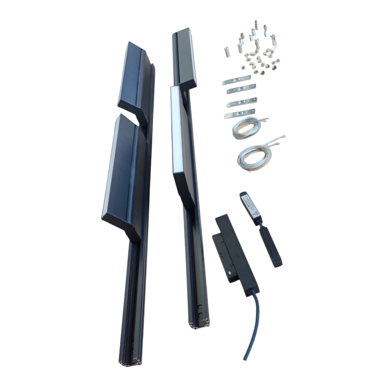 A set of modern black metal stair handrails with matching mounting hardware, brackets, and cables, displayed on a clean white background.