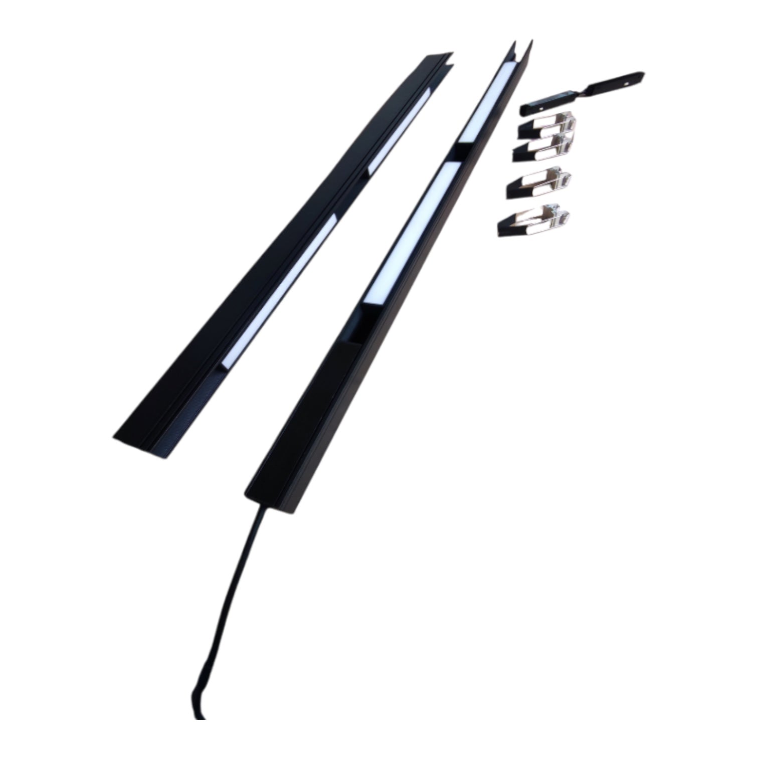 A black linear LED light bar kit shown disassembled into two long pieces with several small mounting clips, photographed on a plain white background.