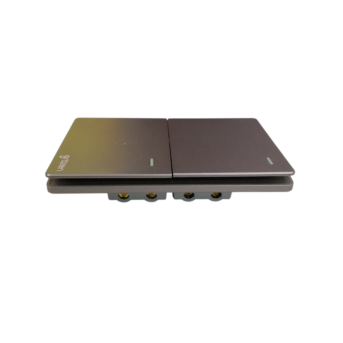A dual-port wireless charging pad with a dark metallic bronze finish, featuring two flat rectangular charging surfaces and two gold-plated connector ports on the side, shown against a plain white background.