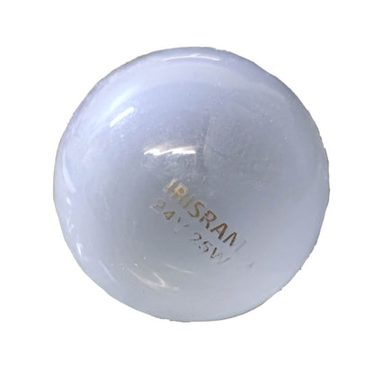 A round, dome-shaped translucent white cabochon gemstone with gold-foiled engraving reading 'IRISRAM 24K 25W' on a plain white background.