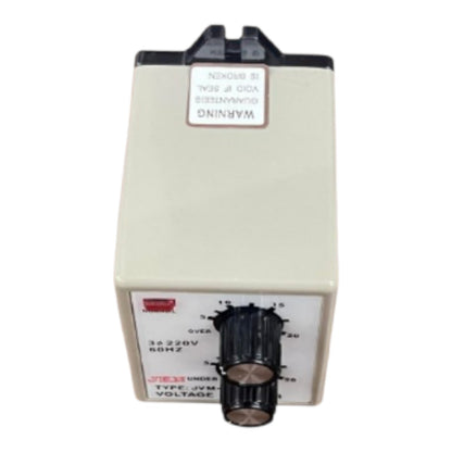 A small electrical control box with a beige plastic housing, a black rotary dial, and warning labels on the front, isolated on a white background.