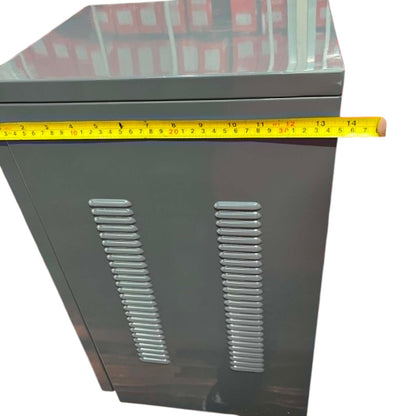Metal cabinet with a measuring tape indicating dimensions on a white background