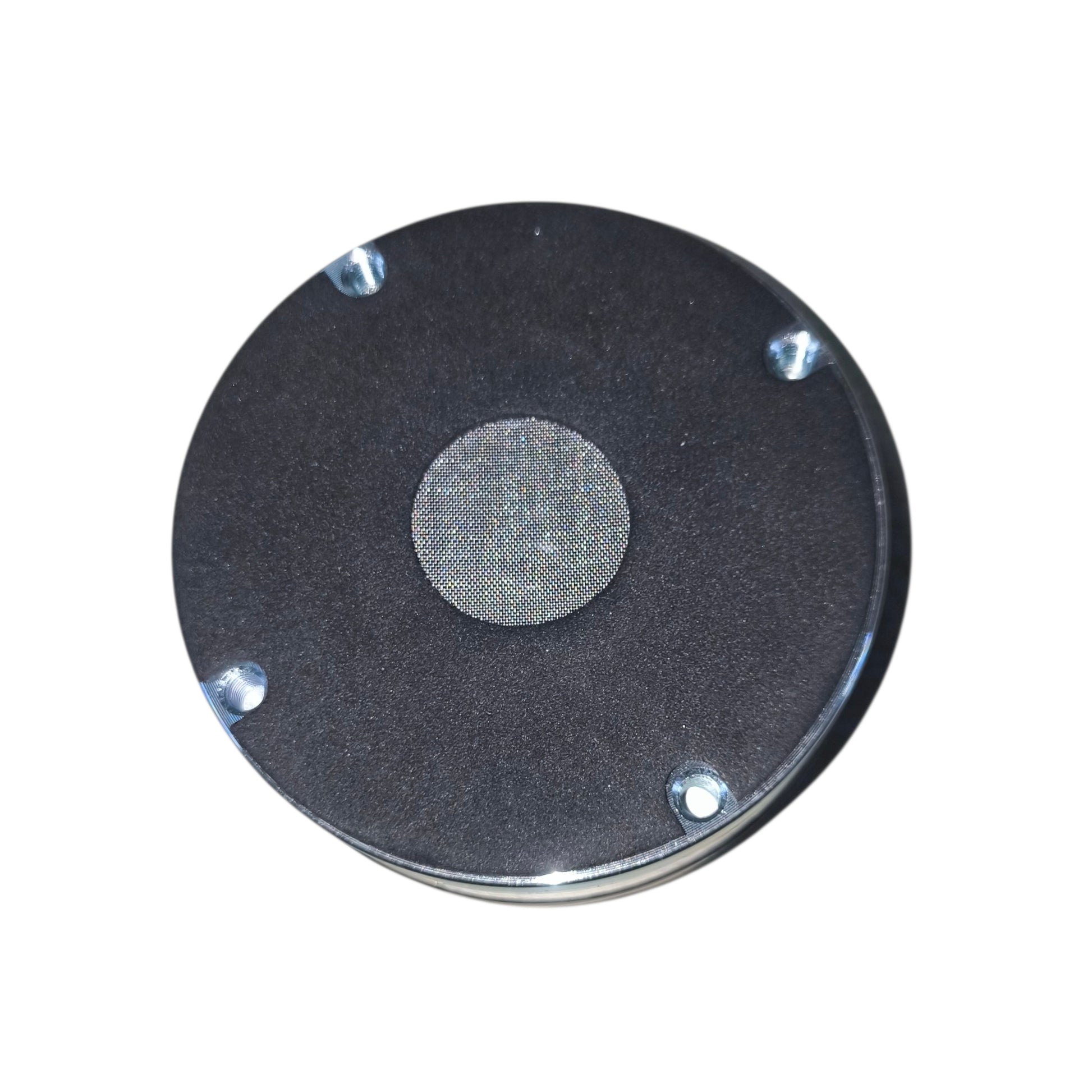 Round metallic object with central circular component on a white background