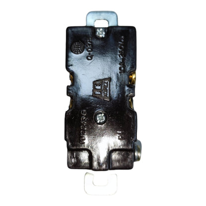 A heavy-duty black metal electrical terminal block or connector with a silver metal tab at the top and a clear plastic loop at the bottom, shown on a white background.