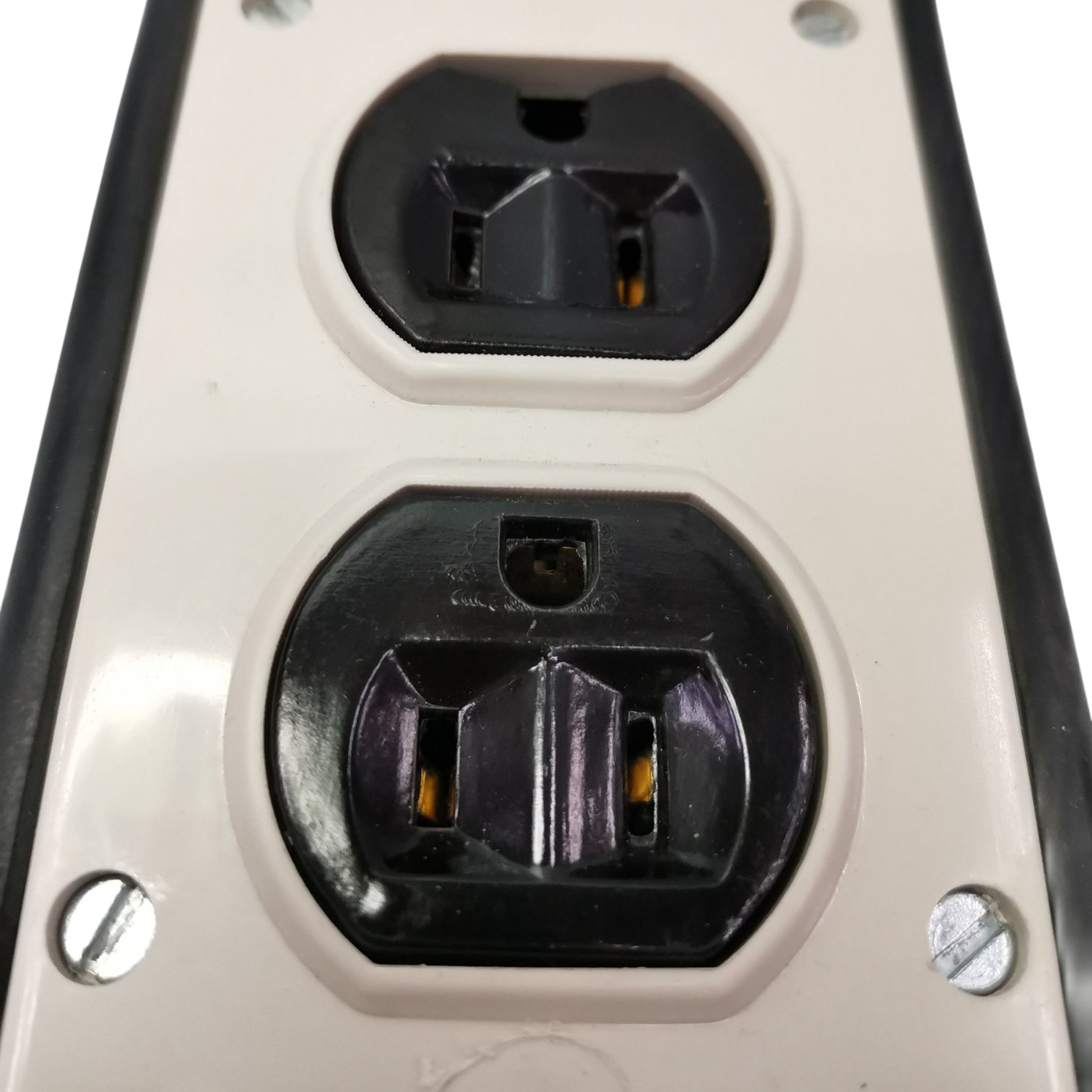 Close-up of a power outlet with two sockets on a white background