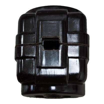 A black plastic cylindrical component with a central square cutout and horizontal ridges, isolated on a white background.