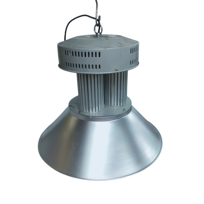 Hanging industrial light fixture on a white background