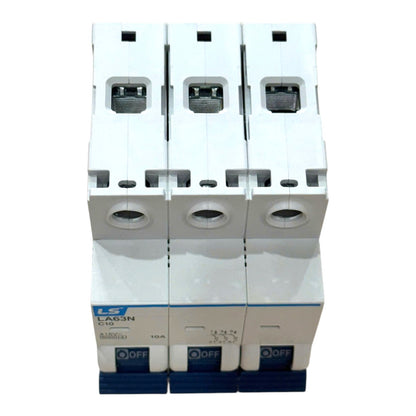 Three LS brand modular circuit breakers, 32A 4P, white plastic with blue base and switch details, shown on a white background.