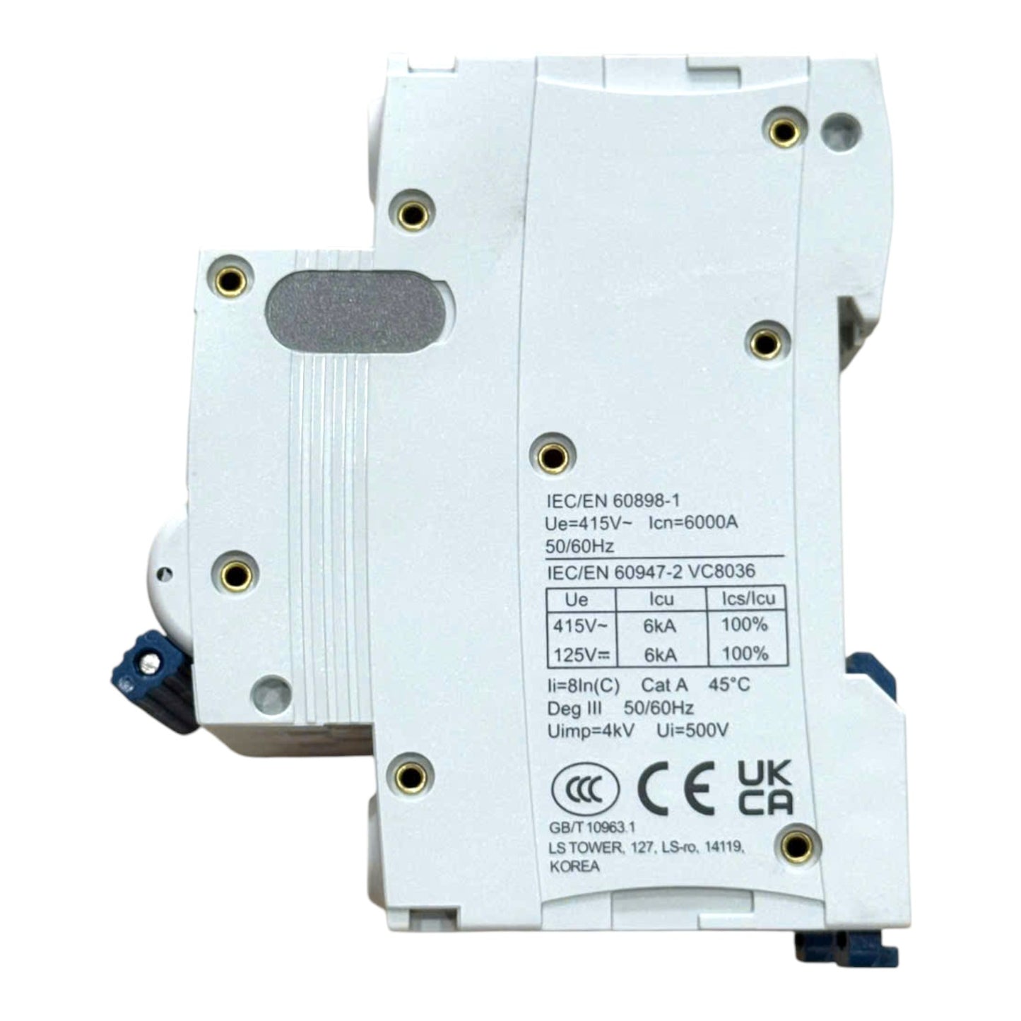 A white plastic molded electronic component with printed technical specifications and certification marks on the side, photographed on a plain white background.