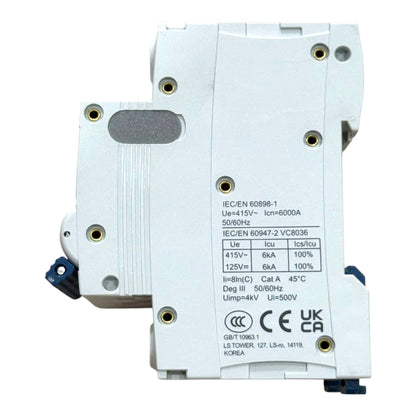 A white plastic molded electronic component with printed technical specifications and certification marks on the side, photographed on a plain white background.