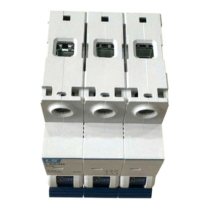 Three modular circuit breakers stacked vertically, featuring white plastic housings with blue lower switches and dark green terminal windows, shown against a plain white background.