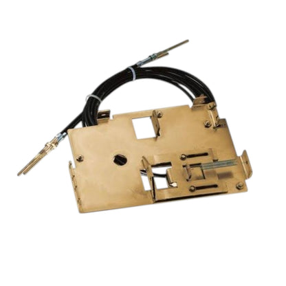 A brass door pull handle mechanism with a black cable and metal rods, isolated on a white background.
