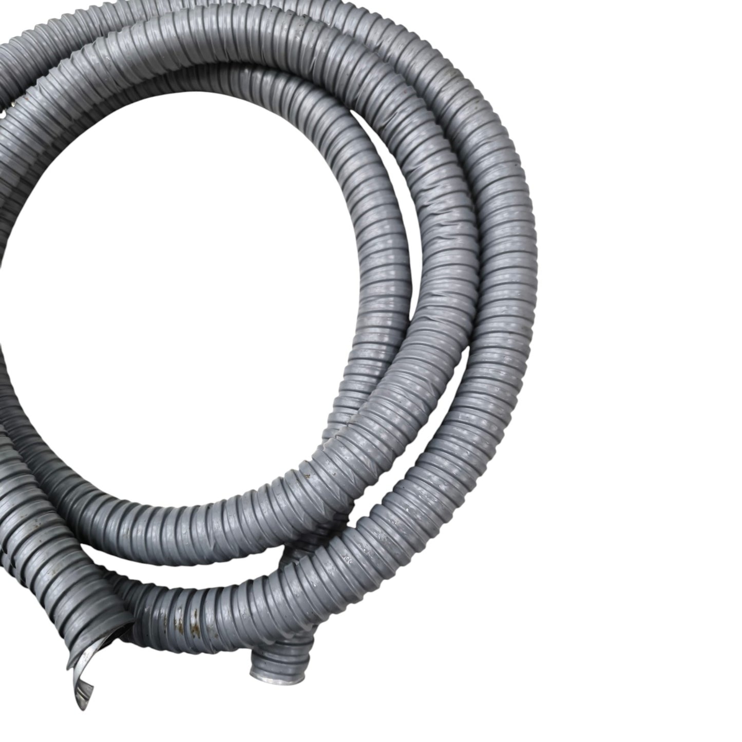Coiled gray flexible hose on a white background