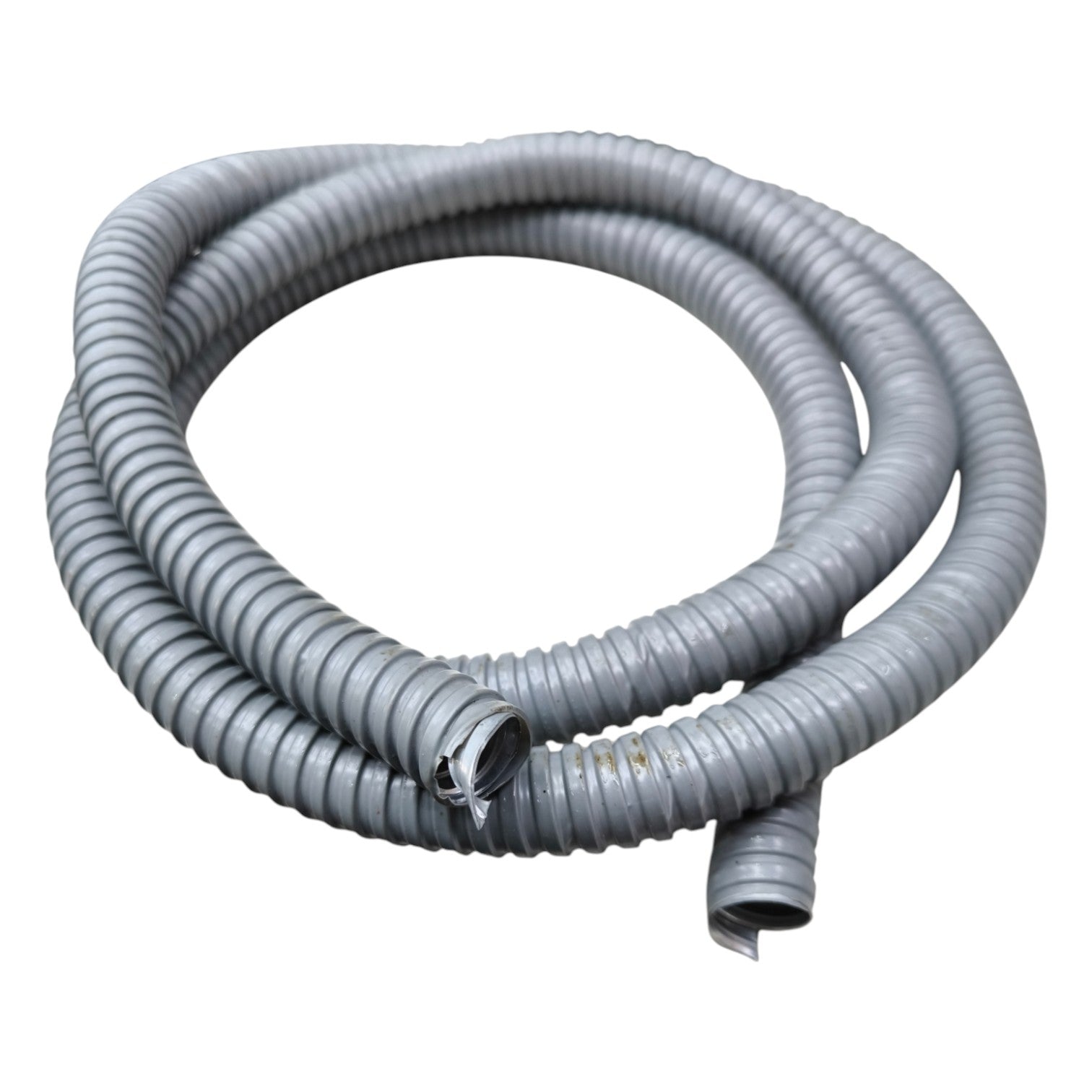 Coiled gray flexible hose on a white background