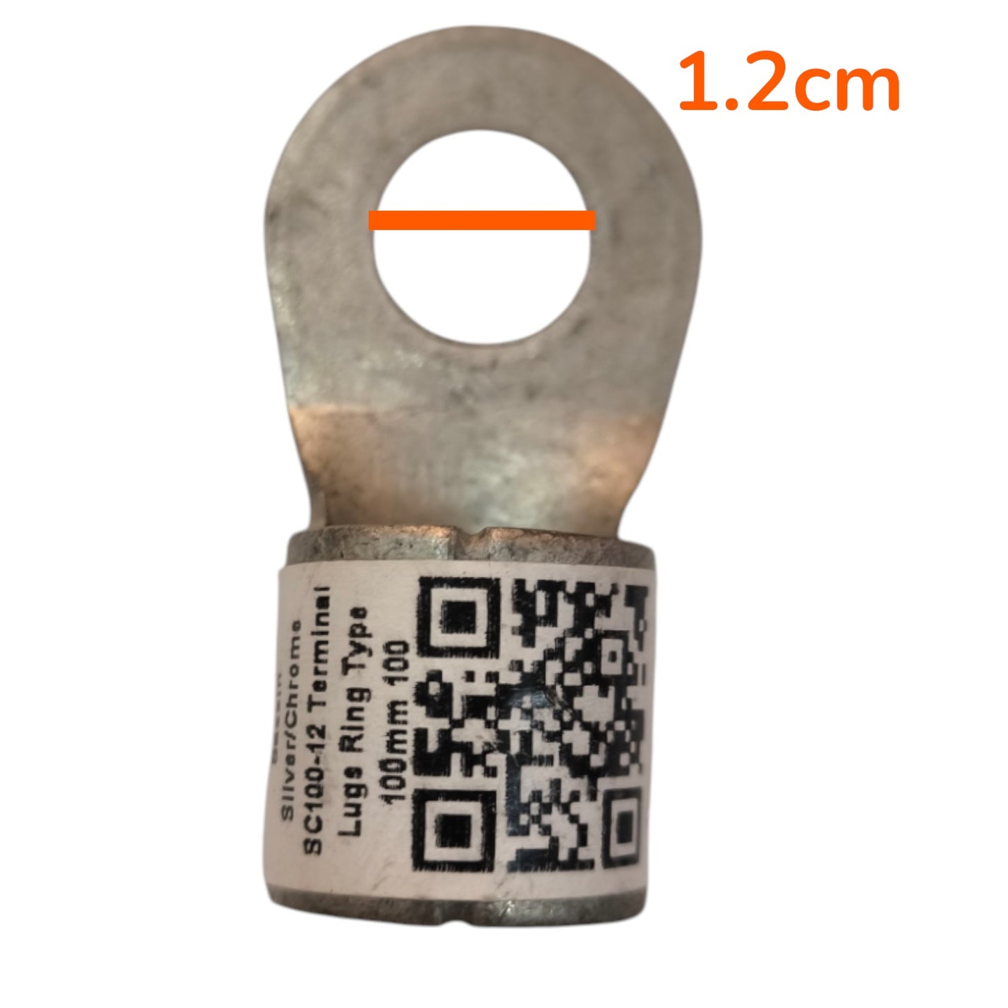 A silver-colored metal lug ring terminal with a printed label reading 'SilverChrome Sci-Du-Si Terminal Lugs Ring Type 100mm 100' and a QR code, shown on a white background with an orange measurement line and '1.2cm' text indicating the diameter.
