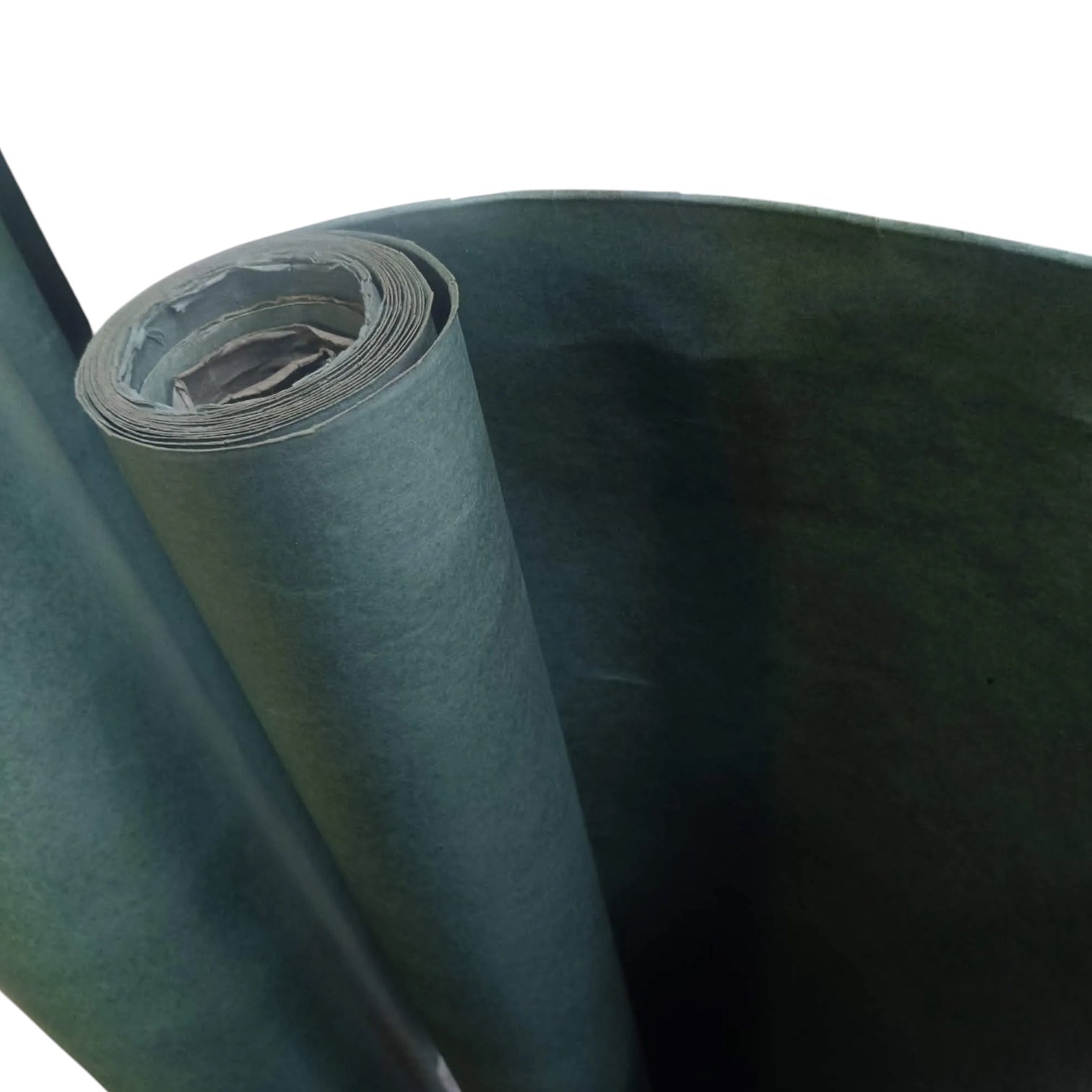 A roll of dark green felt or fabric material, partially unrolled to show its texture and thickness, set against a plain white background.