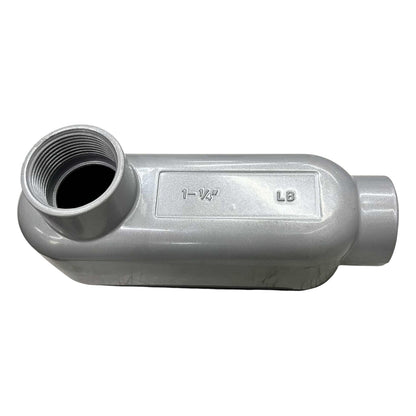 Gray metal pipe fitting with threaded end on a white background
