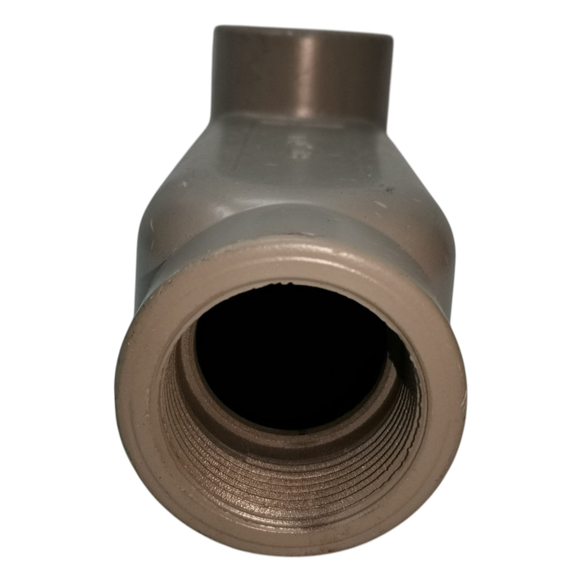 Bronze pipe fitting on a white background