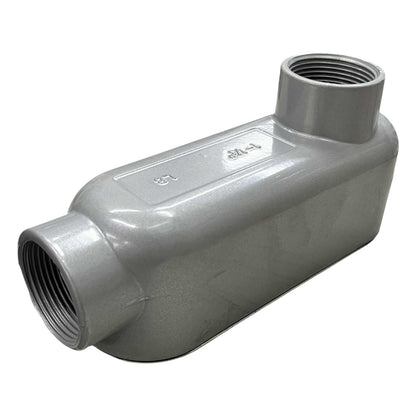 Gray plastic pipe fitting on a white background