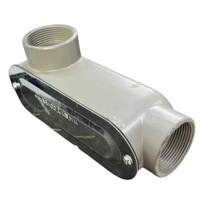 Plumbing fitting with threaded ends on a white background