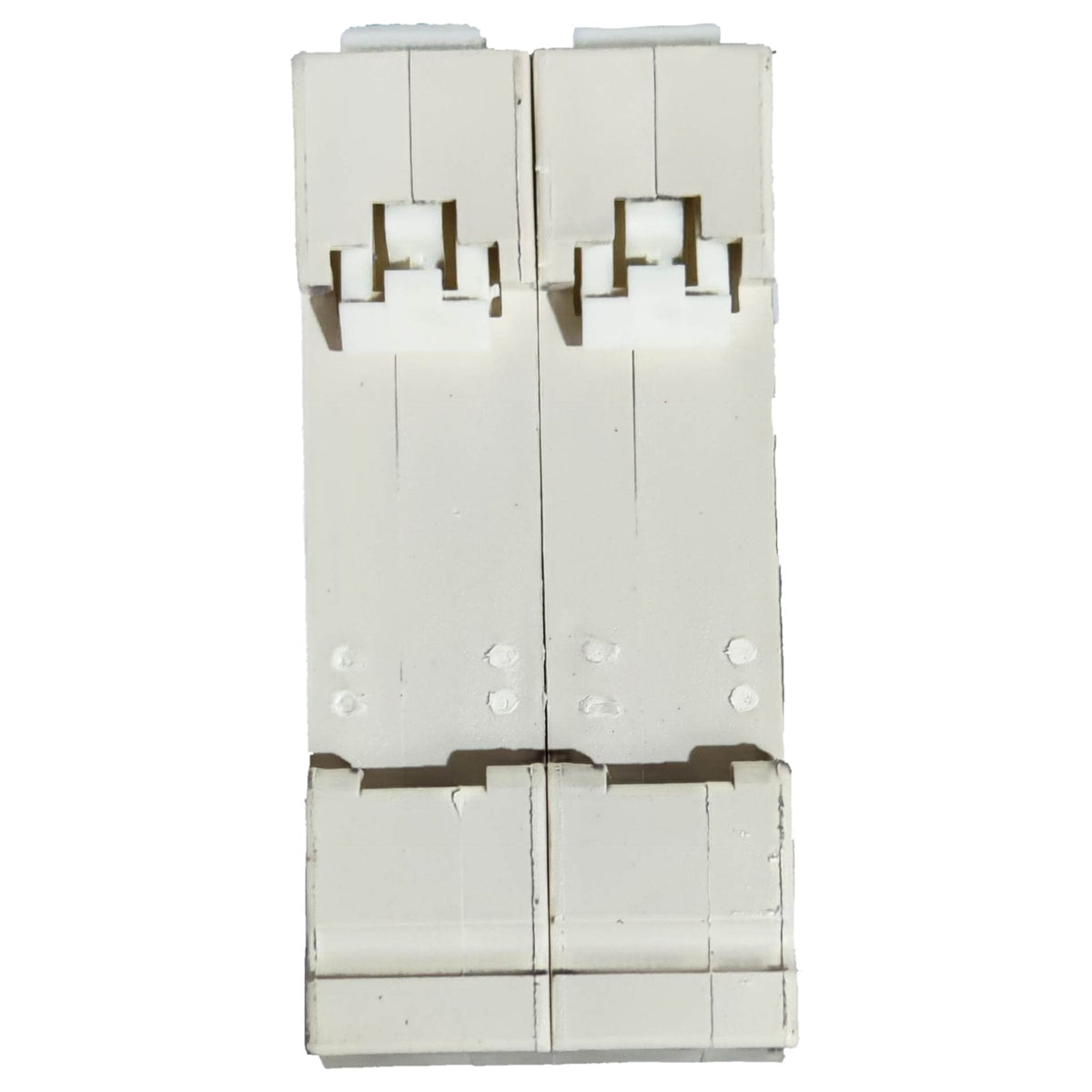 White plastic component with multiple holes and slots on a white background