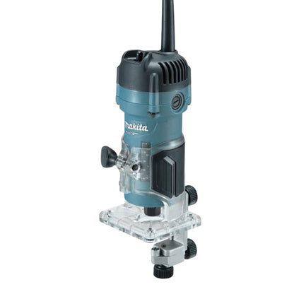 Makita cordless plunge router with a teal and black body, clear acrylic base plate, and black adjustment knobs, shown on a solid white background.