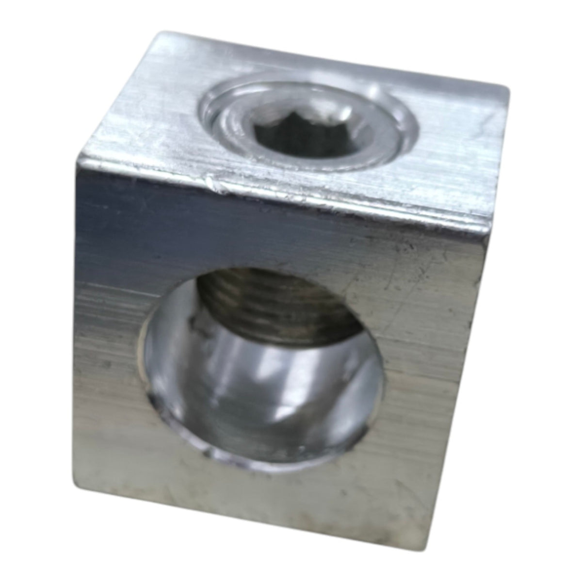Metal block with threaded holes on a white background