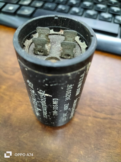 Motor starting capacitor 280-366 MFD black cylindrical electrical part with metal terminals