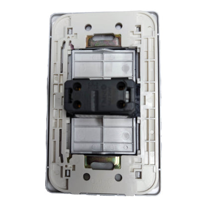 A close-up of a wall switch electrical component showing the internal black socket module and silver metal contacts set within a beige plastic backplate, isolated on a white background.
