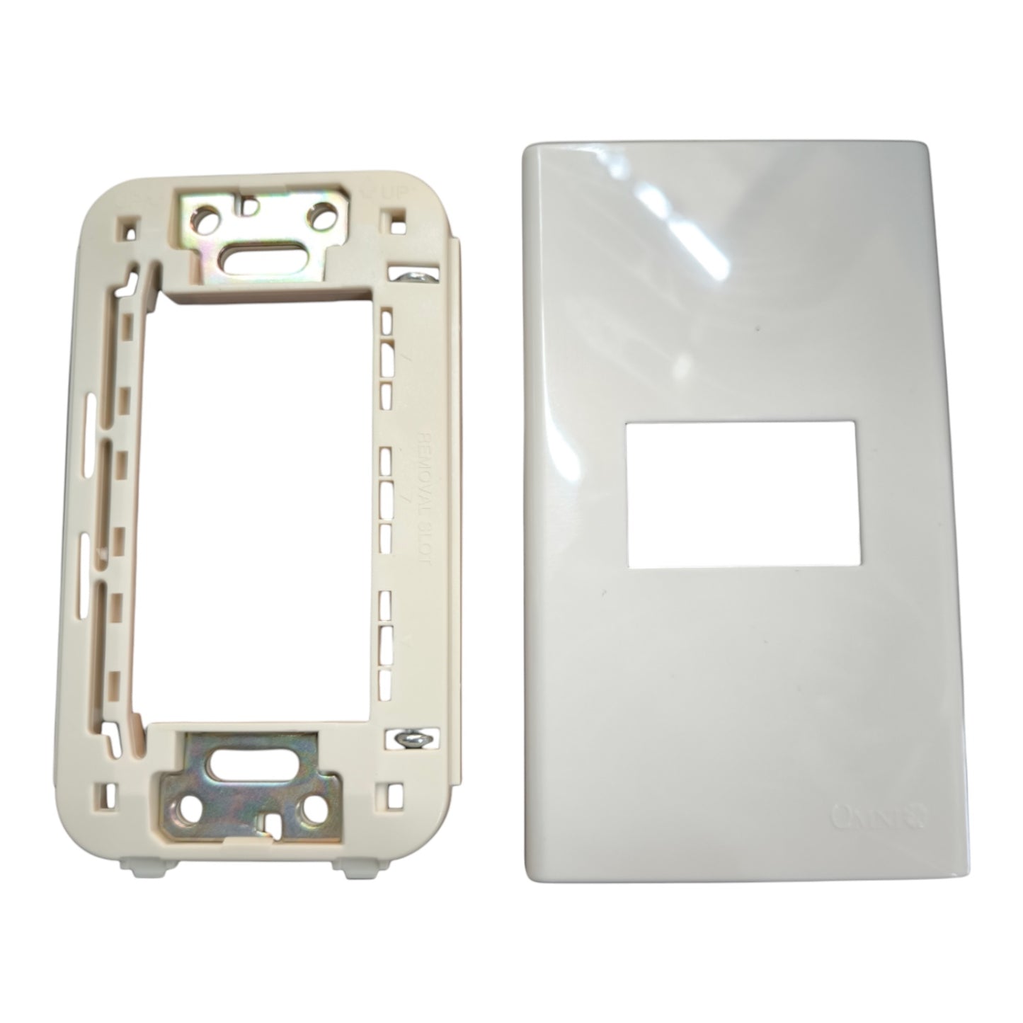 A white glossy rectangular wall plate cover with a central rectangular cutout, shown next to a cream-colored plastic mounting frame insert on a white background.