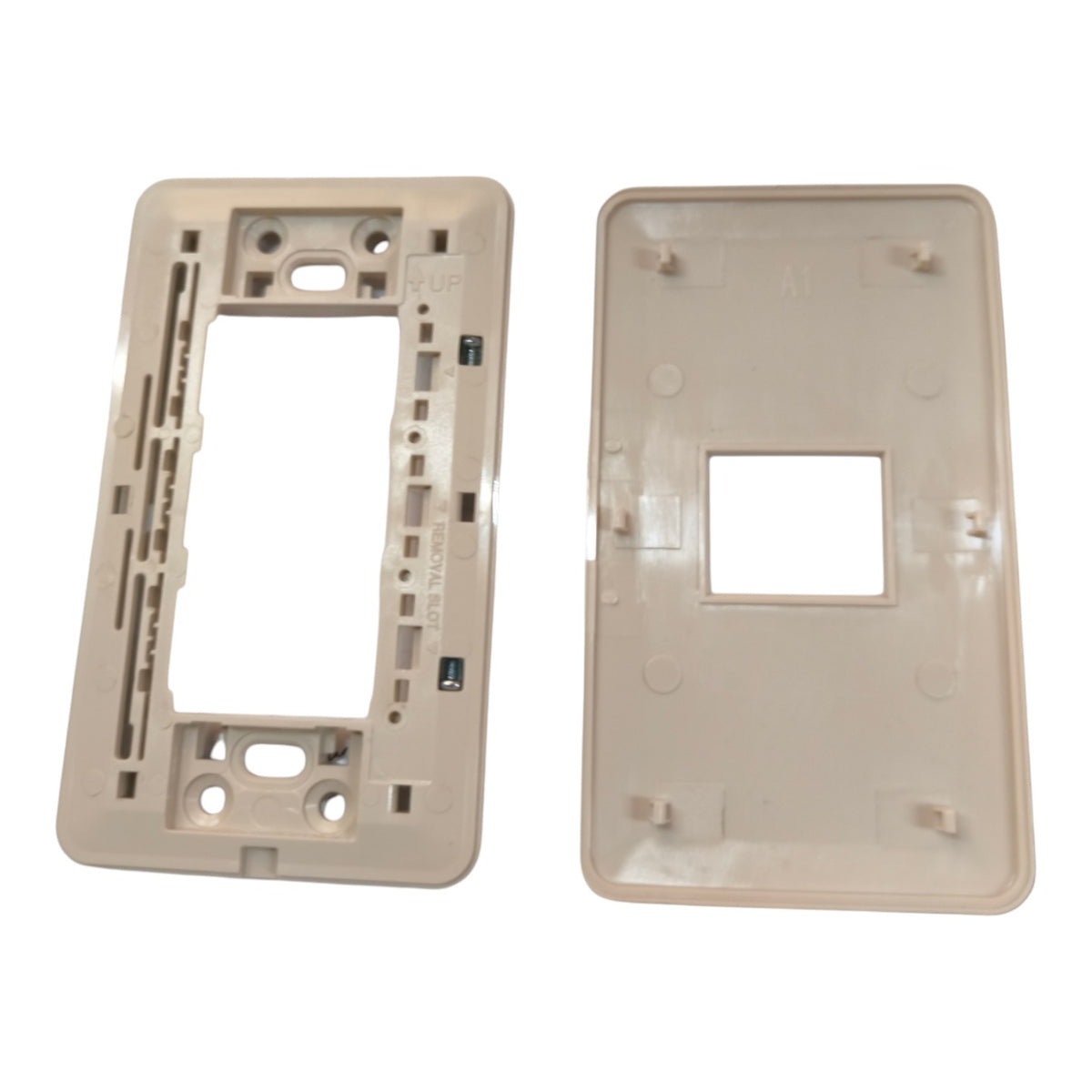 A replacement light switch plate set consisting of a beige mounting frame on the left and a matching beige cover plate on the right, shown against a plain white background.