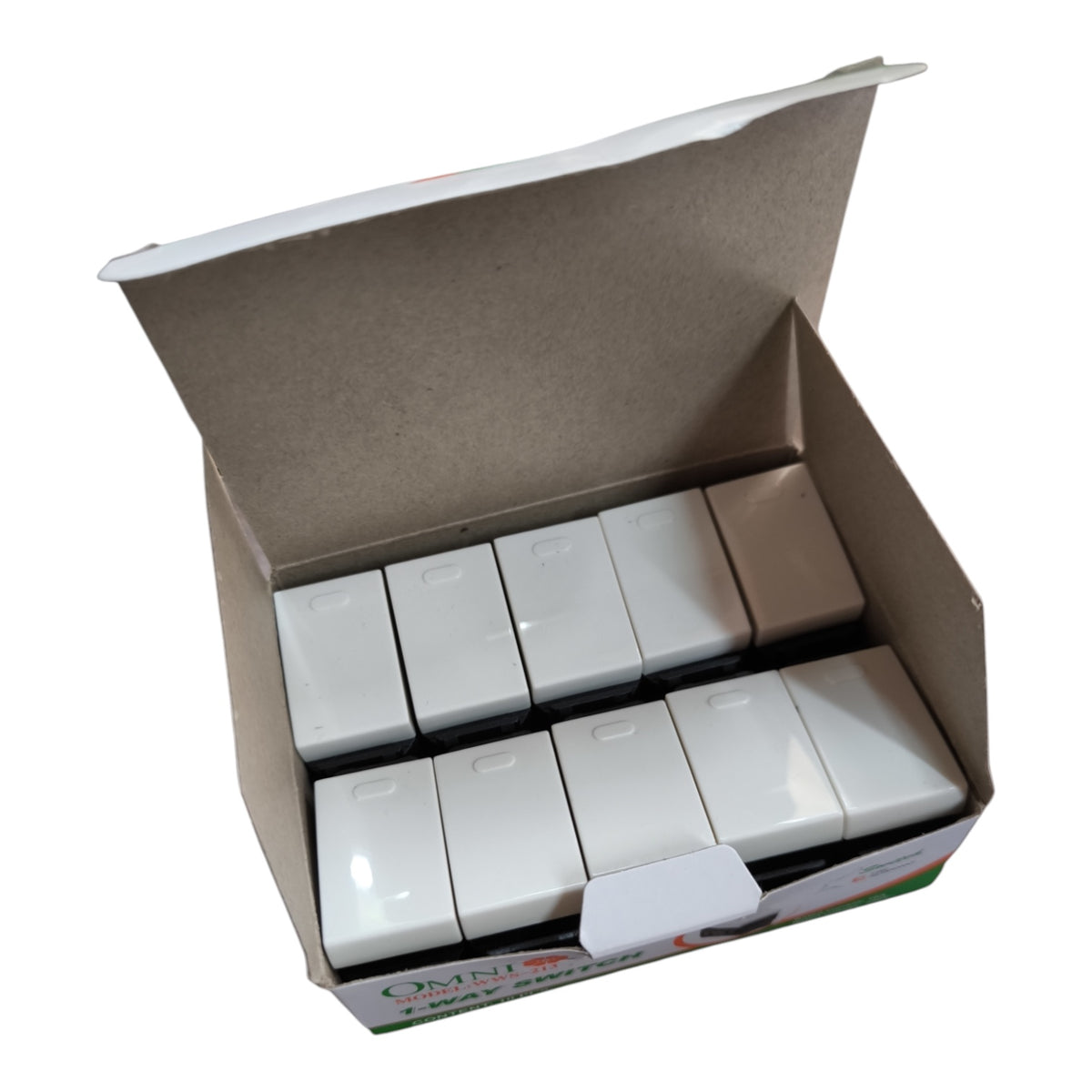An open cardboard box containing multiple white rectangular electronic modules or switches, photographed on a plain white background.
