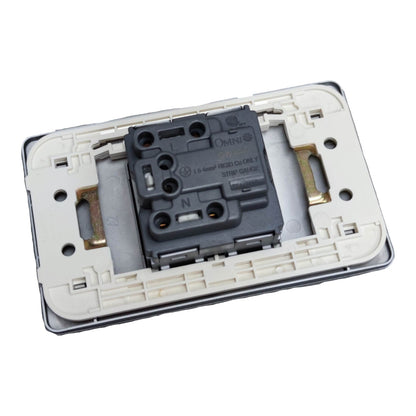 A close-up of a wall switch plate backplate showing the internal socket assembly with a black OMNI 16A 4-pin rear socket in a cream-colored plastic frame.